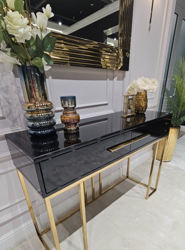KONSOLA Naomi z dwiema szufladami, czarny połyskujący blat, złoty stelaż, styl glamour 120 cm, najwyższa jakość