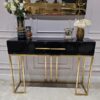 KONSOLA Naomi z dwiema szufladami, czarny połyskujący blat, złoty stelaż, styl glamour 120 cm, piękna