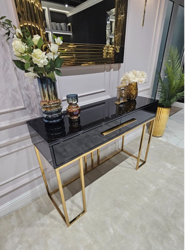 KONSOLA Naomi z dwiema szufladami, czarny połyskujący blat, złoty stelaż, styl glamour 120 cm, wyjątkowa