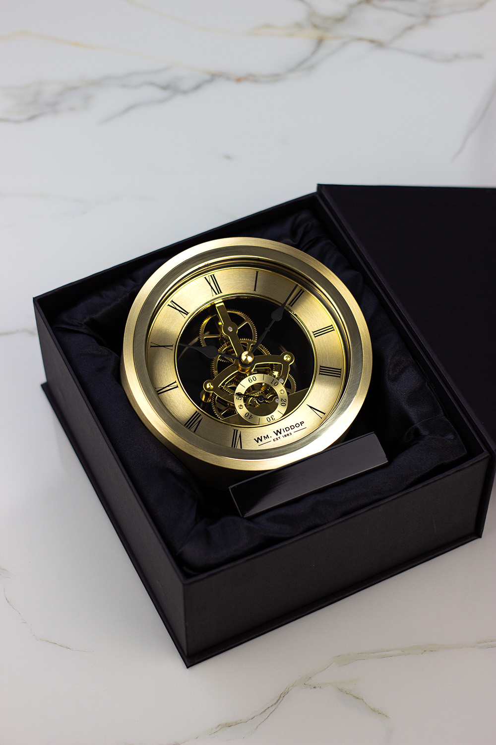 ZEGAR STOJĄCY okrągły, złoty, na czarnej podstawie, z widocznym mechanizmem, glamour ZEGAR STOJĄCY okrągły, złoty, na czarnej podstawie, z widocznym mechanizmem, glamour