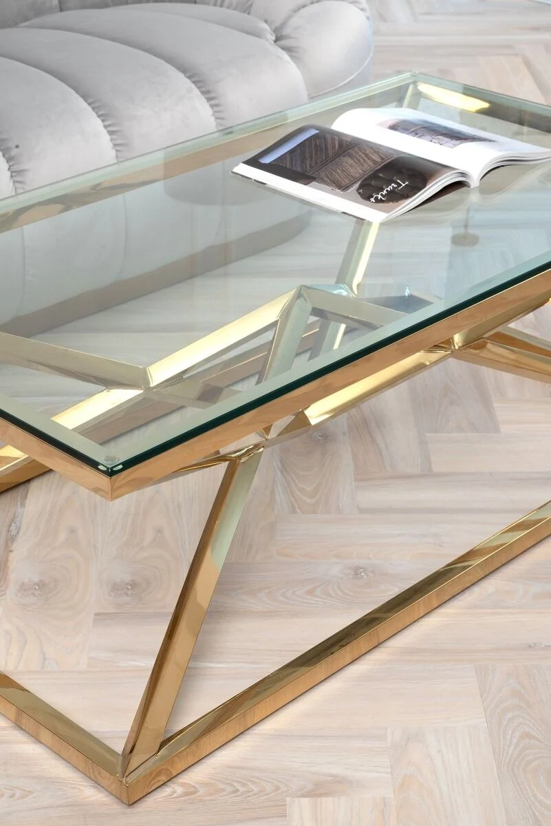 STOLIK KAWOWY na złotym dekoracyjnym stelażu, transparentny blat, nowojorski glamour, do salonu