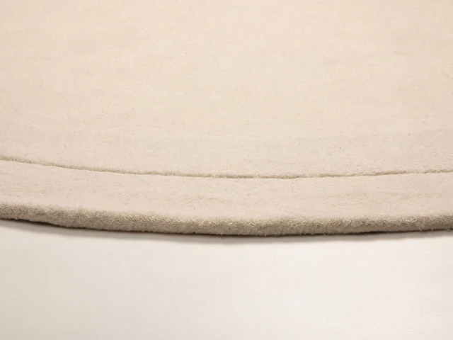 DYWAN Cloria z naturalnej wełny, biały, nowoczesny, designerski kształt, wyjątkowy