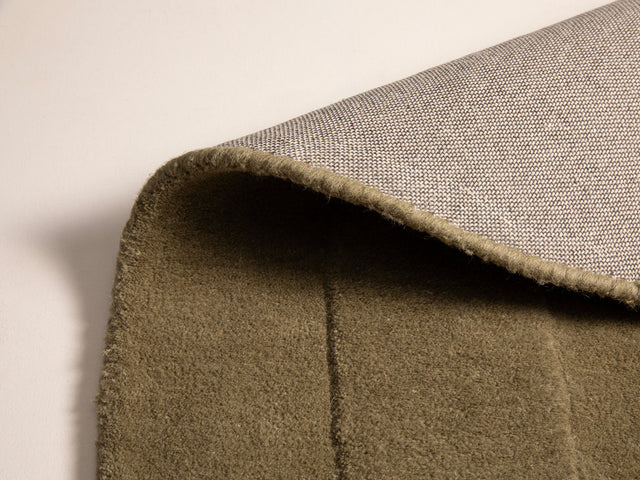 DYWAN Cloria z naturalnej wełny, nowoczesny, designerski kształt, kolor khaki, ekskluzywny DYWAN Cloria z naturalnej wełny, nowoczesny, designerski kształt, kolor khaki, ekskluzywny