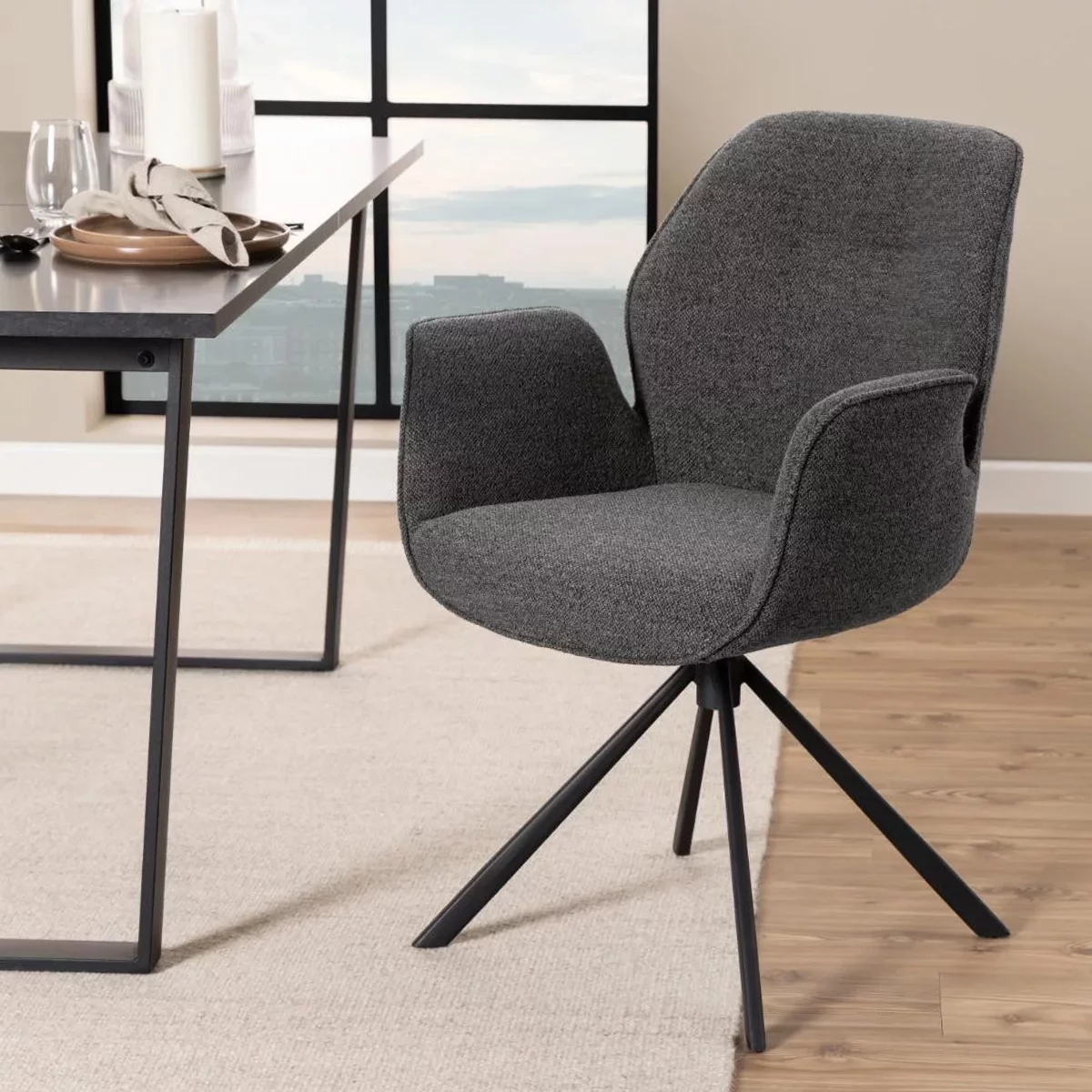 KRZESŁO Livia na czarnym czteroramiennym stelażu z mechanizmem obrotowym, różne kolory tkaniny, nowoczesny styl, antracytowe, do salonu