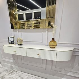 TOALETKA Clairmont w kolorze off-white (biały półmat), wisząca, ryflowane fronty, złote metalowe detale