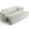SOFA Ella z funkcją spania, tapicerka boucle w jasnobeżowym wydaniu, zaoblone kształty, designerski styl, ekskluzywna