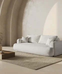 SOFA Ella z funkcją spania, tapicerka boucle w jasnobeżowym wydaniu, zaoblone kształty, designerski styl, piękna