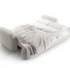 SOFA Ella z funkcją spania, tapicerka boucle w jasnobeżowym wydaniu, zaoblone kształty, designerski styl, premium