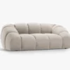 SOFA 2-osobowa Diana o zaoblonych kształtach, pionowe przeszycia, beżowa tkanina, designerski styl, piękna