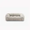 SOFA 2-osobowa Diana o zaoblonych kształtach, pionowe przeszycia, beżowa tkanina, designerski styl
