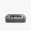 SOFA 2-osobowa Diana o zaoblonych kształtach, pionowe przeszycia, szara tkanina, designerski styl