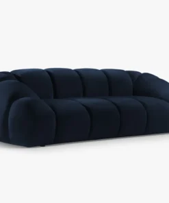 SOFA 3-osobowa Diana o zaoblonych kształtach, pionowe przeszycia, ciemnoniebieska tkanina, designerski styl, piękna