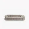 SOFA 4-osobowa Diana o zaoblonych kształtach, pionowe przeszycia, beżowa tkanina, designerski styl