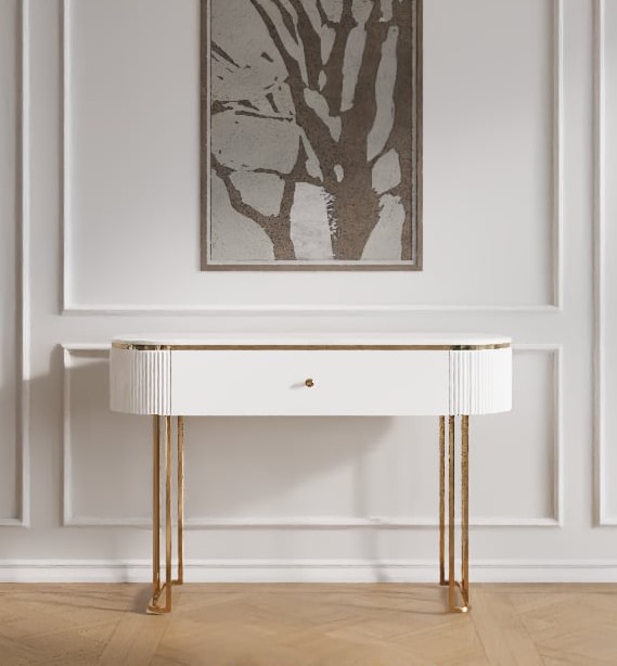 KONSOLA Anne na złotych błyszczących nogach, bialy korpus z ryflowaniem po bokach i praktyczną szufladą, złote detale KONSOLA Anne na złotych błyszczących nogach, bialy korpus z ryflowaniem po bokach i praktyczną szufladą, złote detale