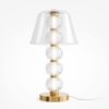 LAMPA STOŁOWA Amulet, złota podstawa ze szklanymi kulami, transparentny abażur, nowoczesny glamour