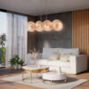 LAMPA WISZĄCA Aster na złotej, metalowej oprawie, podłużna, szklane koła z dekoracyjnymi żłobieniami, nowoczesny styl, do salonu