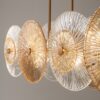 LAMPA WISZĄCA Aster na złotej, metalowej oprawie, podłużna, szklane koła z dekoracyjnymi żłobieniami, nowoczesny styl, premium