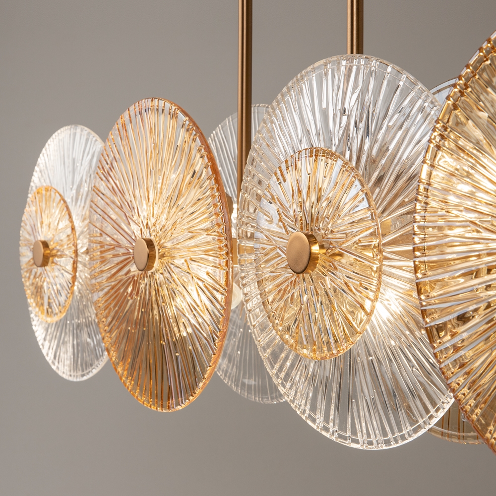 LAMPA WISZĄCA Aster na złotej, metalowej oprawie, podłużna, szklane koła z dekoracyjnymi żłobieniami, nowoczesny styl, premium LAMPA WISZĄCA Aster na złotej, metalowej oprawie, podłużna, szklane koła z dekoracyjnymi żłobieniami, nowoczesny styl, premium