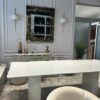 STÓŁ Incante owalny na dwóch nogach, nogi z MDF-u lakierowanego, biały z złotymi detalami, blat ze spieku kamiennego - 220 x 100 cm, designerski