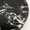 STOLIK KAWOWY Mambo na grafitowej, metalowej podstawie w kształcie pół klepsydry, okrągły blat imitujący marmur, nowoczesny styl, premium