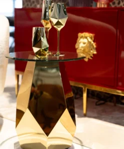STOLIK POMOCNICZY Ricchezza na złotej, metalowej podstawie o geometrycznych kształtach, okrągły, szklany blat, piękny