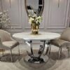 STÓŁ JADALNIANY Ring okrągły, na srebrnej, eleganckiej podstawie, biały blat z konglomeratu marmurowego, nowoczesny glamour