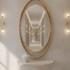 LUSTRO ŚCIENNE Aurelia Oval w owalnej złotej, błyszczącej ramie ze stali nierdzewnej, designerski styl