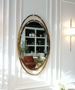 LUSTRO ŚCIENNE Aurelia Oval w owalnej złotej, błyszczącej ramie ze stali nierdzewnej, designerski styl