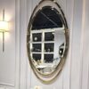LUSTRO ŚCIENNE Aurelia Oval w owalnej złotej, błyszczącej ramie ze stali nierdzewnej, designerski styl, piękne