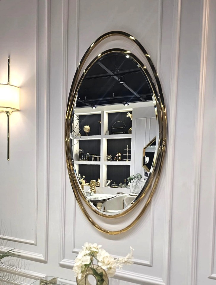 LUSTRO ŚCIENNE Aurelia Oval w owalnej złotej, błyszczącej ramie ze stali nierdzewnej, designerski styl, piękne