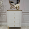 KOMODA Anne Fosco biała z czterema szufladami, ryflowany korpus, złote szczotkowane detale, nowoczesny styl