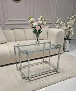 STOLIK KAWOWY Elisse prostokątny, srebrny stelaż ze stali nierdzewnej, szklany blat, nowoczesny styl glamour - 80 x 50 cm, transparentny blat
