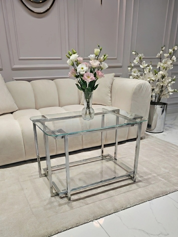 STOLIK KAWOWY Elisse prostokątny, srebrny stelaż ze stali nierdzewnej, szklany blat, nowoczesny styl glamour - 80 x 50 cm, transparentny blat STOLIK KAWOWY Elisse prostokątny, srebrny stelaż ze stali nierdzewnej, szklany blat, nowoczesny styl glamour - 80 x 50 cm, transparentny blat