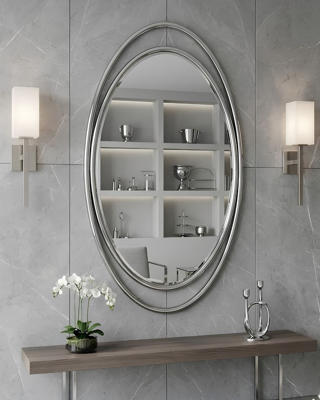 LUSTRO ŚCIENNE Aurelia Oval w owalnej srebrnej, błyszczącej ramie ze stali nierdzewnej, designerski styl