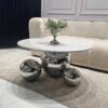 STOLIK KAWOWY Balance Orio, srebrna błyszcząca podstawa w formie trzech kul, okrągły biały blat ze spieku kamiennego, nowoczesny styl