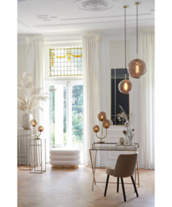 PUF Lyall podłużny na złotej, metalowej podstawie, kremowa tkanina typu boucle, poziome przeszycia, designerski styl, piękny