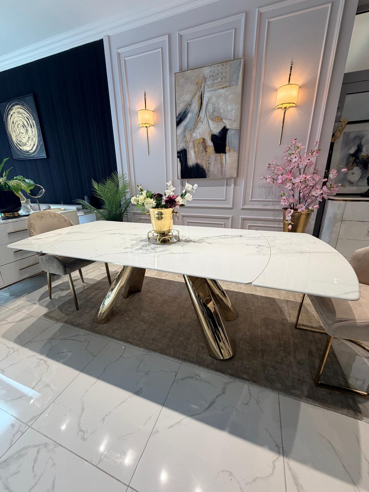 STÓŁ JADALNIANY na złotych, pochylonych półokrągłych nogach, rozkładany blat z konglomeratu marmurowego, nowoczesny styl, piękny