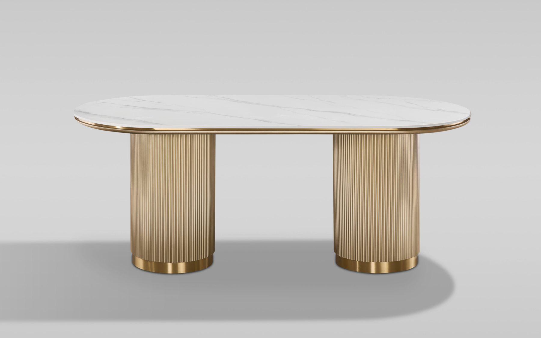 STÓŁ JADALNIANY w kolorze szampańskiego złota, nogi w kształcie walca, z pionowym ryflowaniem, owalny brat z marmuru syntetycznego