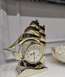 ZEGAR STOJĄCY złoty w kształcie okrętu, błyszczące wykończenie, centralnie umieszczona tarcz, piękny