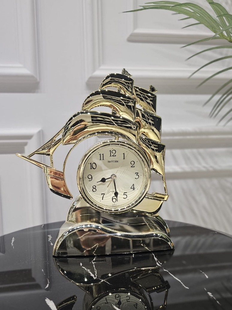 ZEGAR STOJĄCY złoty w kształcie okrętu, błyszczące wykończenie, centralnie umieszczona tarcz, premium