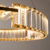 LAMPA WISZĄCA Krone z złotym, błyszczącym stelażem, okrągły kształt, kryształowe elementy, nowoczesny styl, premium LAMPA WISZĄCA Krone z złotym, błyszczącym stelażem, okrągły kształt, kryształowe elementy, nowoczesny styl, premium