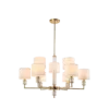 LAMPA WISZĄCA Sutton z 9 źródłami światła, metalowa, złota błyszcząca oprawa, kryształowe detale, białe abażury, nowoczesny styl