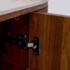 KOMODA Ruben o zaoblonych kształtach, ryflowane boki, gładkie fronty, brązowy korpus, ceramiczny blat, nowoczesny styl, designerska