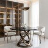STÓŁ JADALNIANY Lune Bronze Fosco okrągły, brązowe szczotkowane nogi w kształcie elipsy, czarny blat z konglomeratu marmurowego, piękny